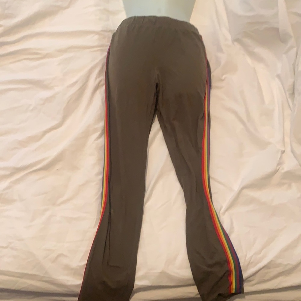 Green tights with rainbow trimming